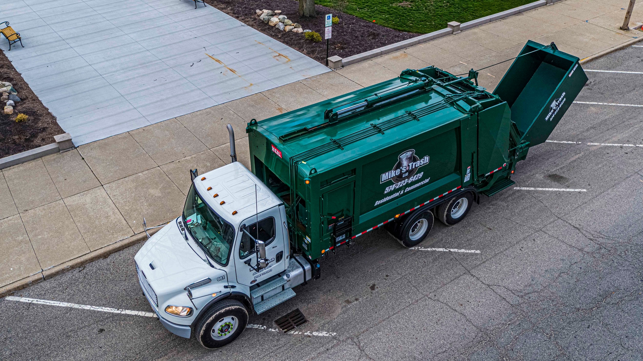 Mike's Trash roll-off service in action