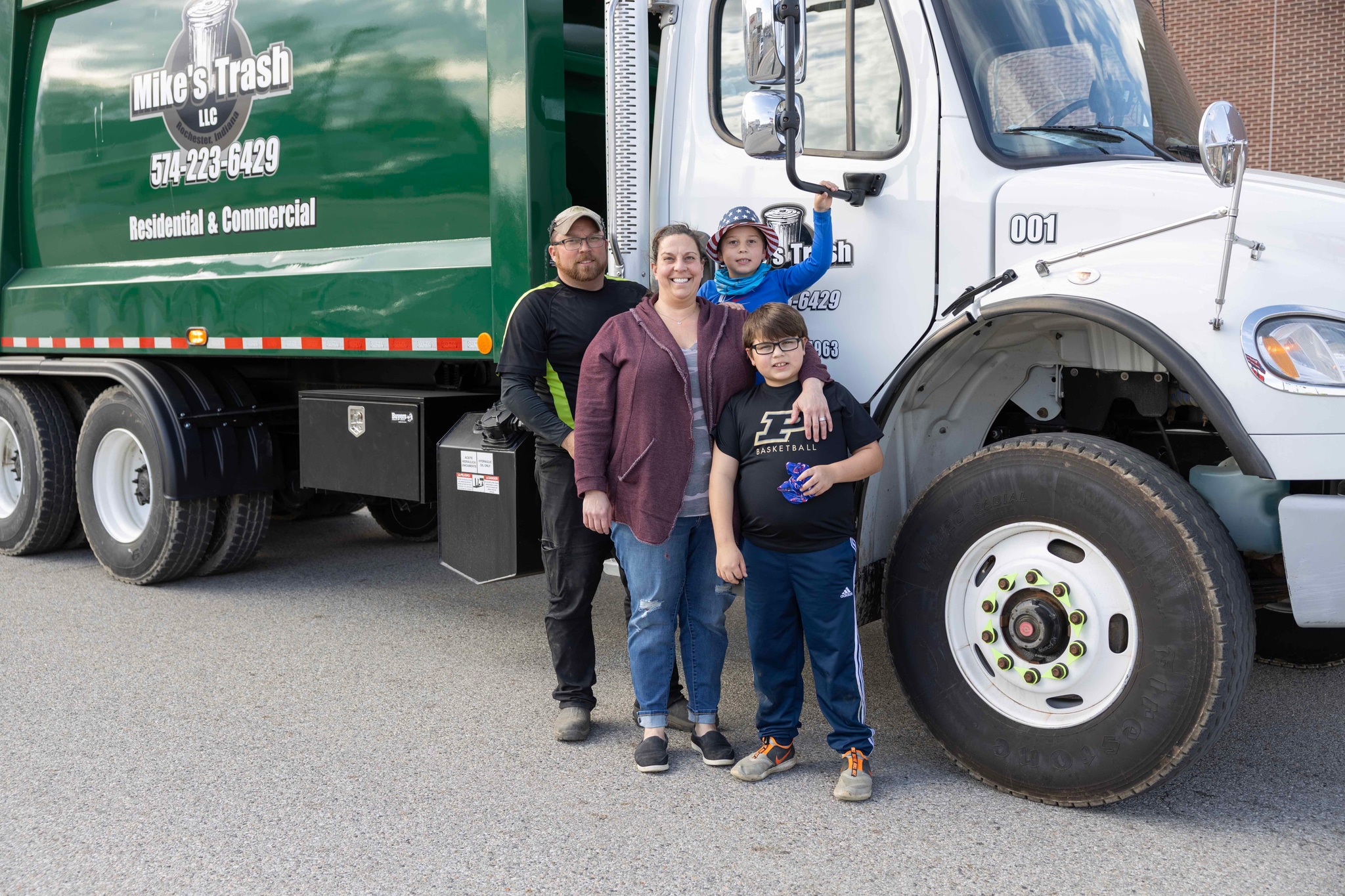 Steve and Mandy Metzger with the Mike's Trash team